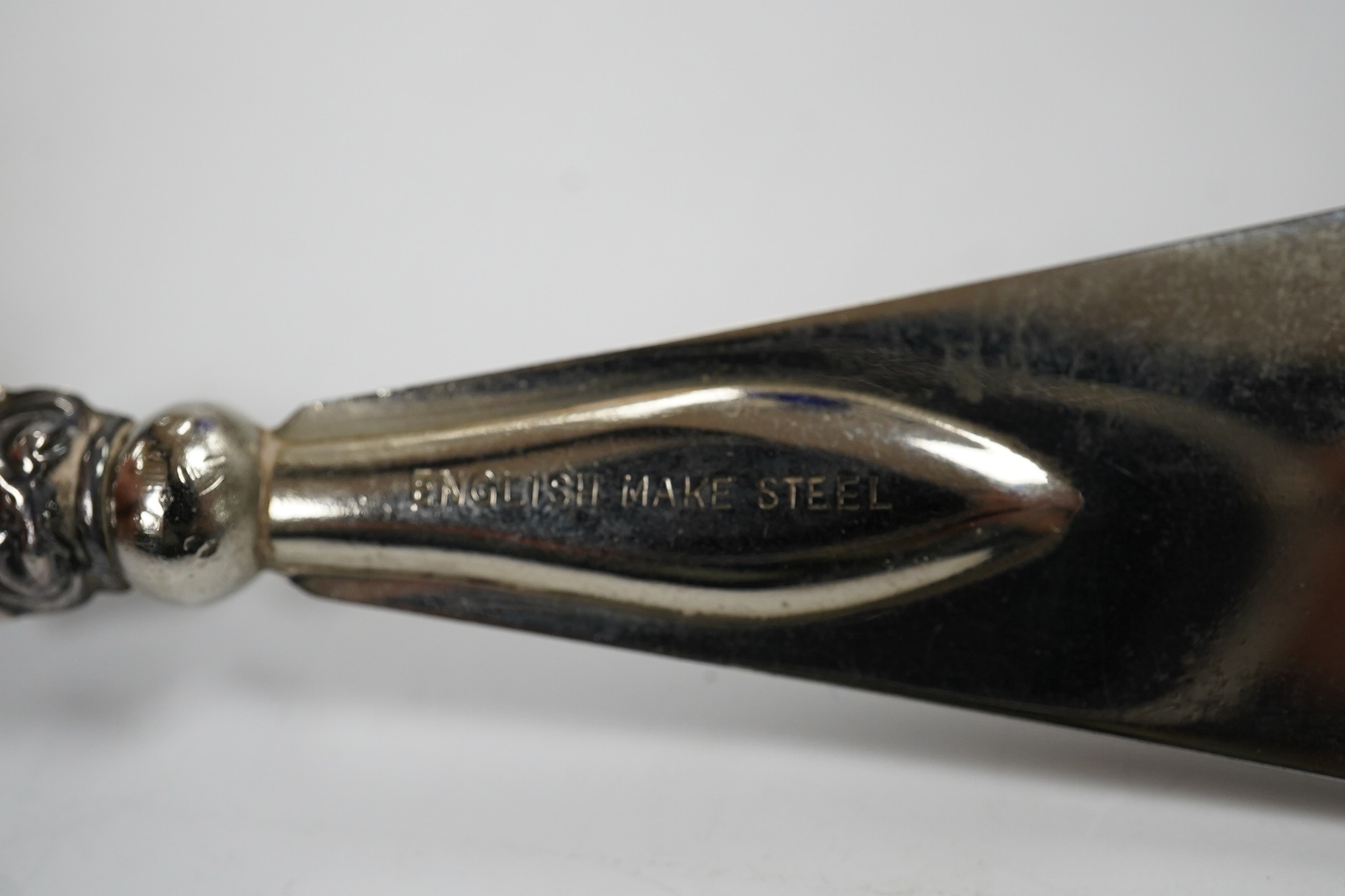 A small group of assorted silver items including mounted blue glass spill vase, 17.2cm, mounted shoe horn and button hook and a trinket dish, together with two other items. Condition - poor to fair